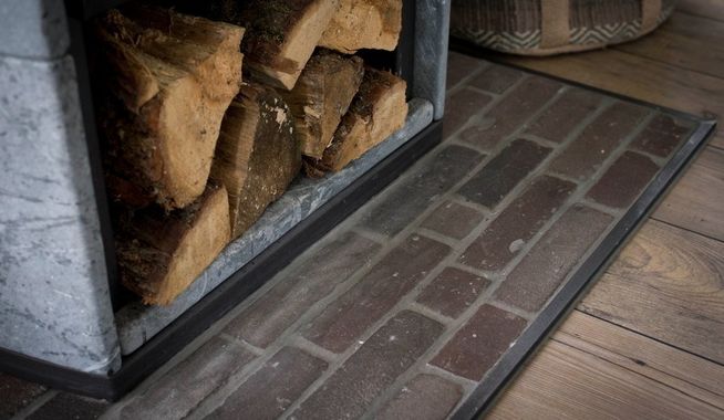 Bestrating rondom kachel